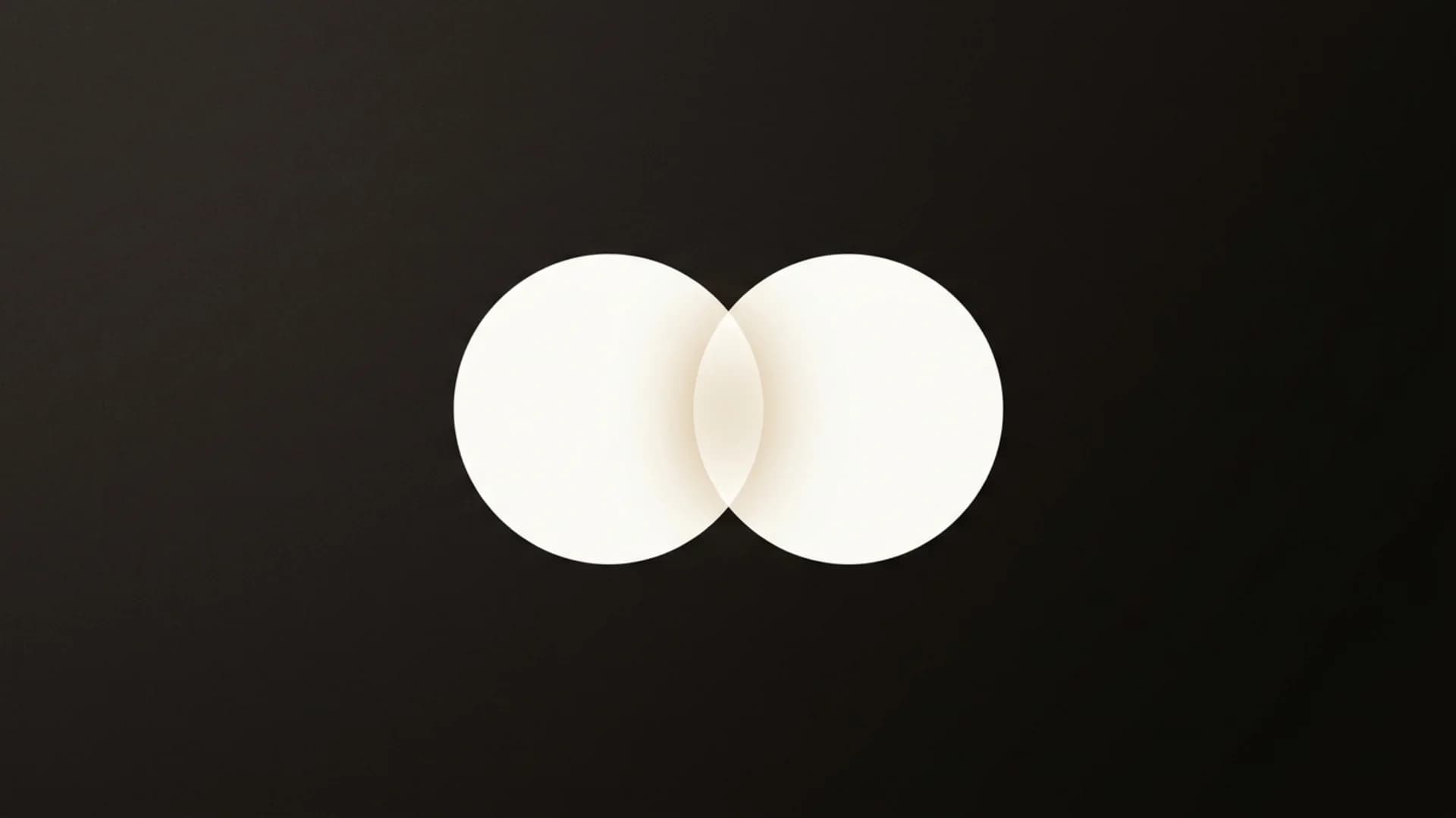 Two minimalist dots combining with an overlapping intersection